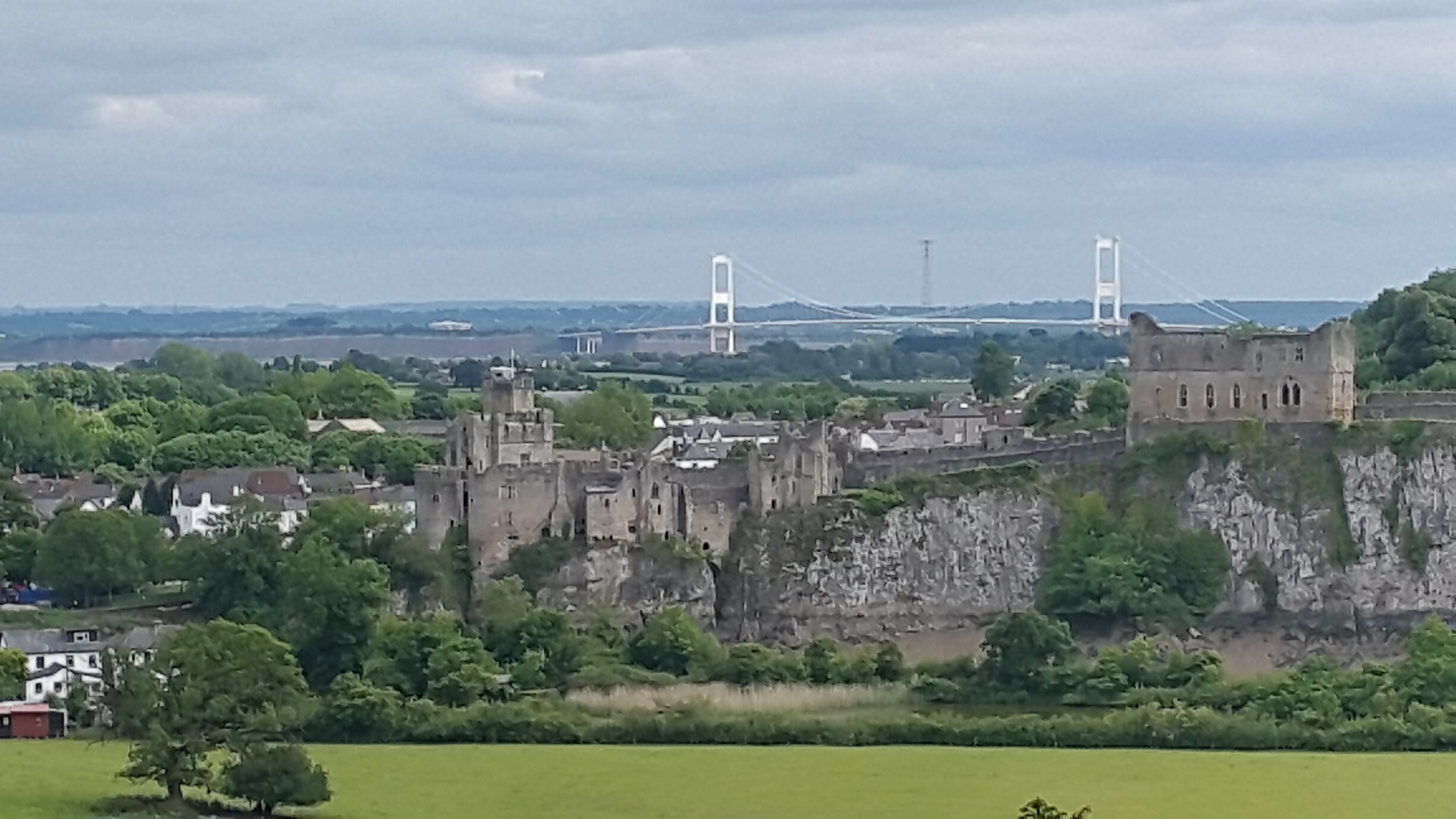 Lovely view of chepstow castle with the severn bridge in the background.