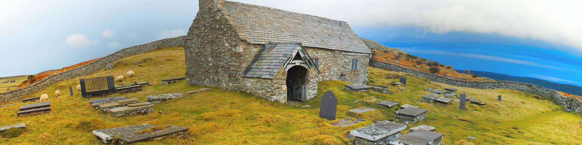 Llangelynnin Church. 12th Century, possibly one of the remotest churches in Wales (53.2458°N 3.8730°W), and is amongst the oldest. It is just over 900 feet above the village of Henryd in the Conwy valley (Dyffryn Conwy).