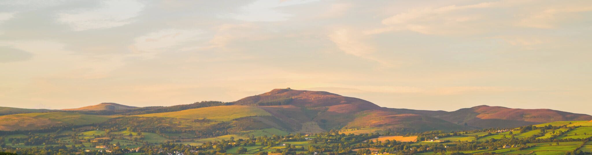 500px provided description: Morning Light On Moel Famau [#Moel Famau ,#Nature ,#Landscape ,#Sunrise ,#Landscapes ,#Morning ,#Colours ,#Sky ,#Light ,#Mountain ,#Clouds ,#Mountains ,#Hill ,#Hills ,#Natural light ,#Early ,#Landmark ,#Natural ,#Nature pics ,#Nature photograph ,#Natural world ,#AONB]