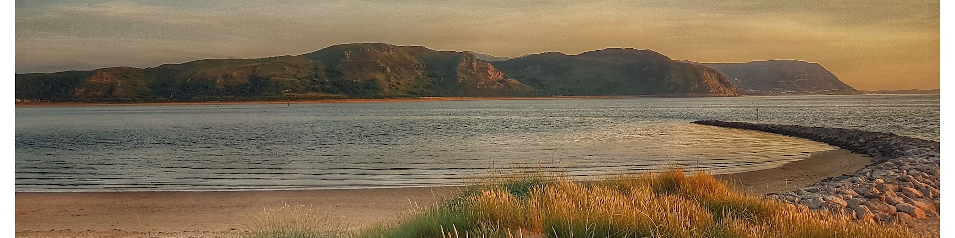 Looking over to Conwy mountain sunsets to the right of you