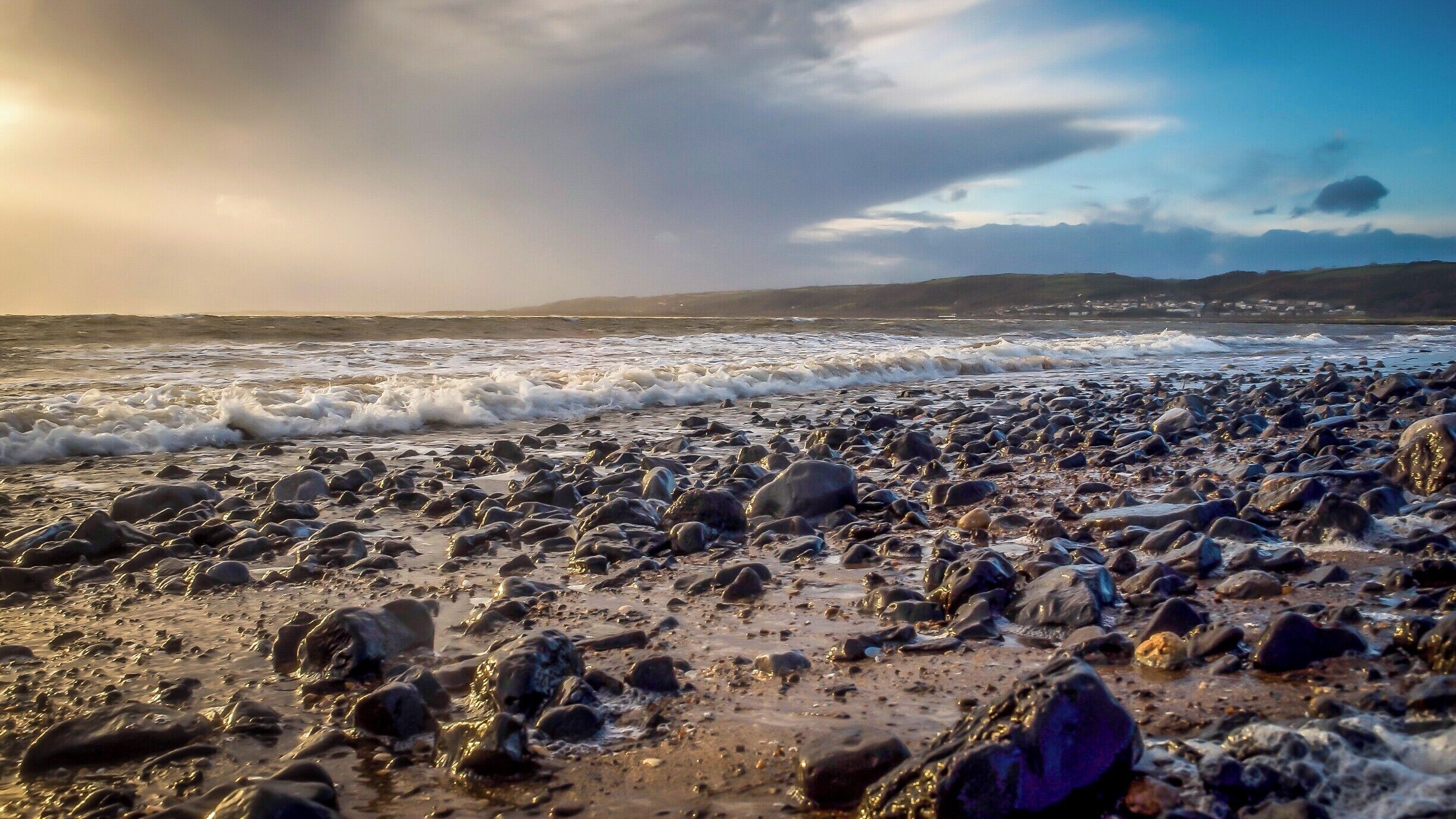 Was a bit cold trying to get this shot but I'm glad I persevered. I particularly like the rocks soaked by the relentless tide. 