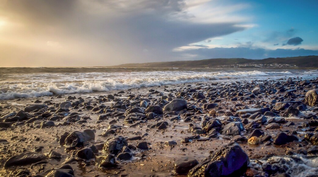 Was a bit cold trying to get this shot but I'm glad I persevered. I particularly like the rocks soaked by the relentless tide.