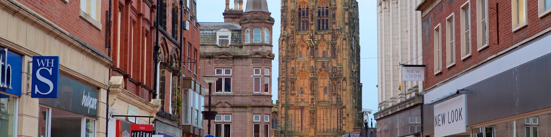 A street with shops, a large cathedral, and a sign for 'New Look'.