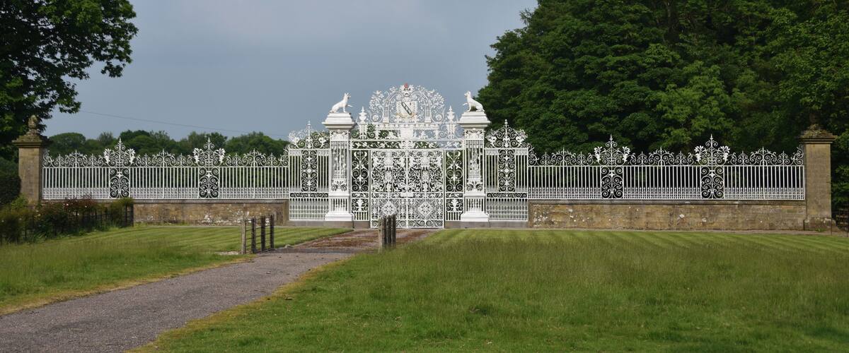 The ornate gate leading into Chirk Castle, a medieval castle near the Welsh border.