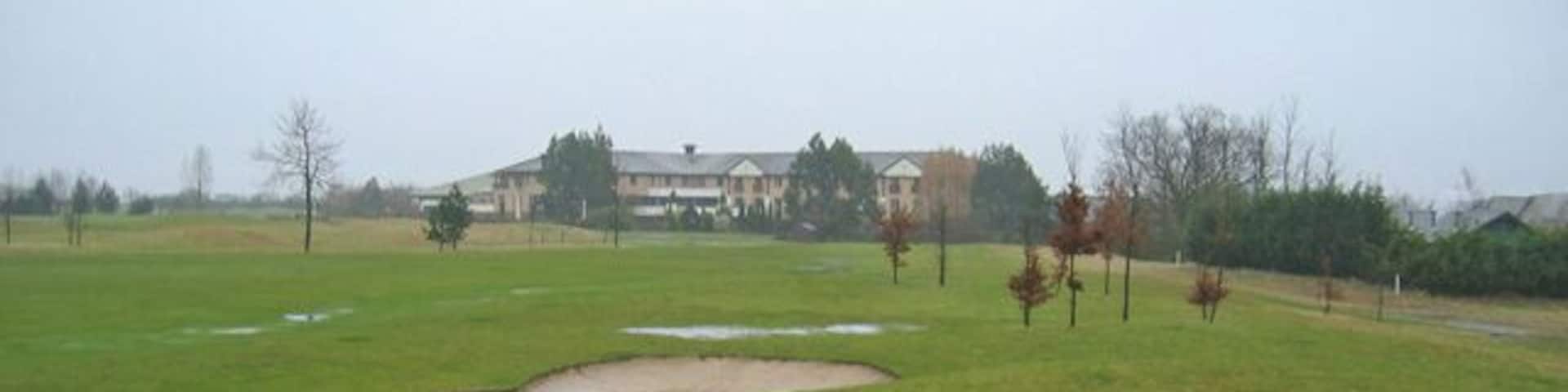 Five Lakes Resort A view of the hotel and country club complex of Five Lakes, seen across a very soggy golf course.