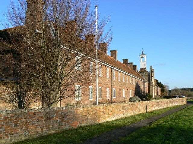 The Somerset Hospital, Froxfield, Wiltshire The building straddles two squares but most of it is in this one. It dates to 1694 in the reign of King William III. Two years later the infamous 'window tax' was introduced, the effect of which can be seen in the facade of this building. There's a bit more about the place here: http://www.wiltshire.gov.uk/community/getfaq.php?id=70