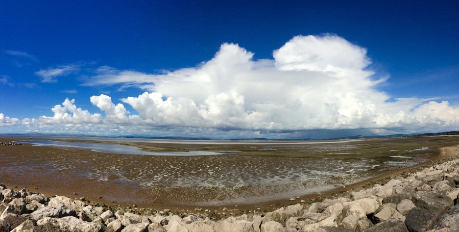 View from the prom, over the bay towards the Lake District. The sands can be treacherous. The tide comes in incredibly quickly and there are numerous patches of quicksand.