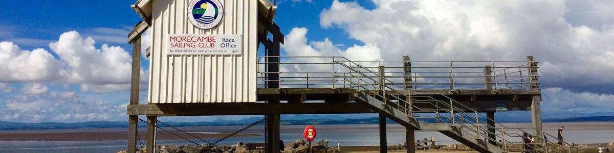 Morecambe Sailing Club Race Office on a sunny afternoon at the end of the school holidays. Nearby new playground makes it a popular spot for families.
