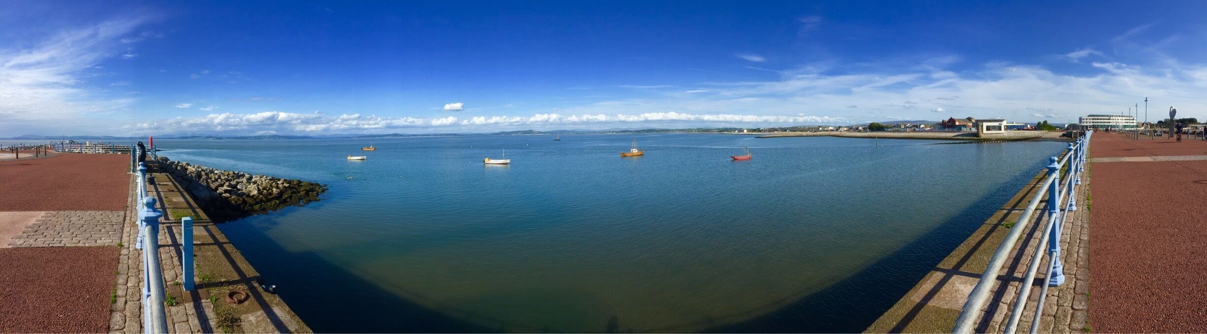 The Stone Jetty has statues and poems about birds. The cafe at the end is the former end of of the railway line where passengers would board the steam boats bound for the Isle of Man. 