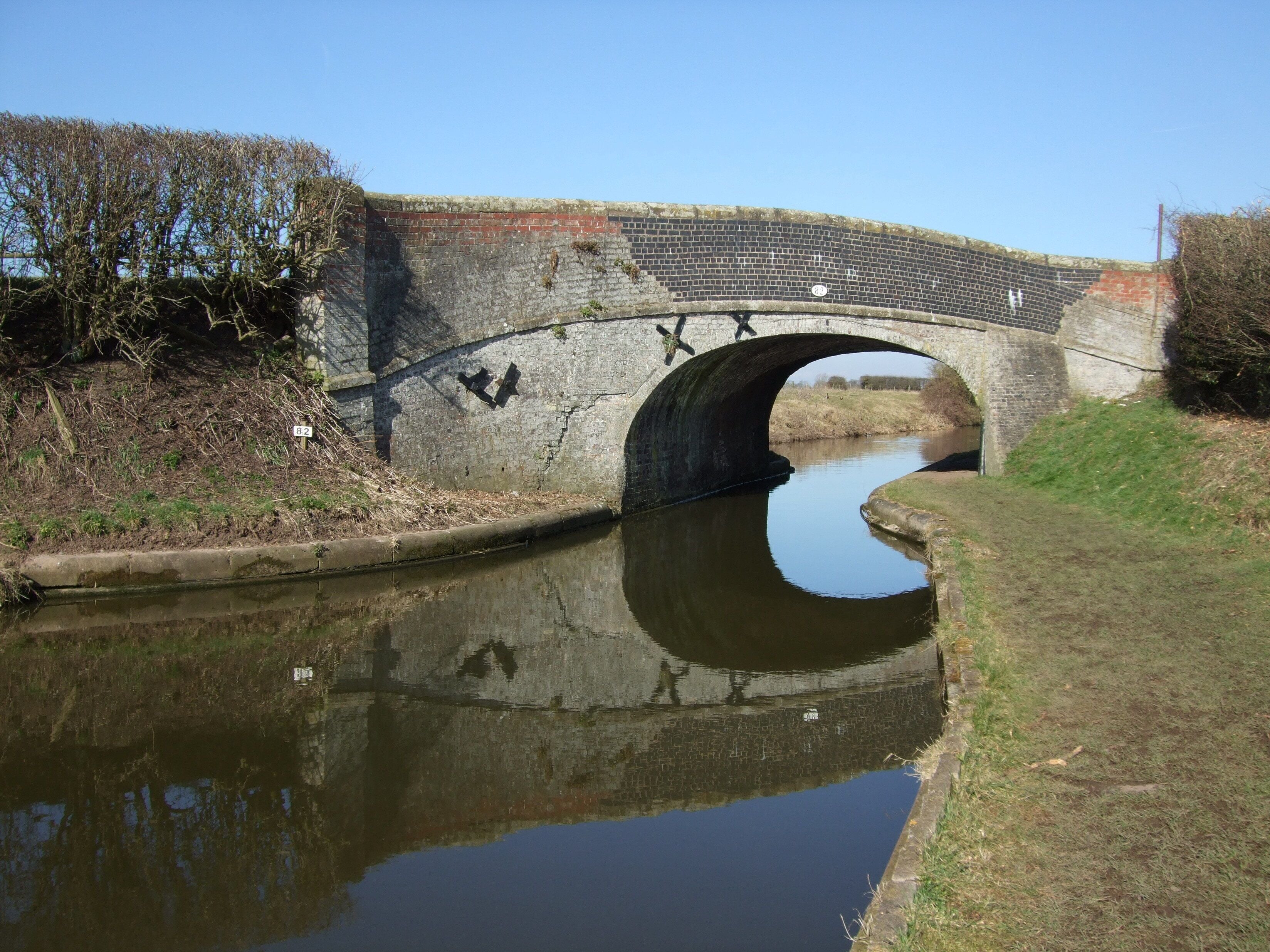 Coole Lane bridge - number 82 - near Audlem Viewed from the Shropshire Union canal footpath. Roadsigns indicate it is a weak bridge.