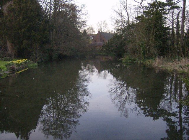 Kingsclere Pond Looking north from the footbridge that takes the footpath over the pond. Possibly a mill pond.