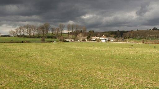 Sandypark. Bad weather brews over the hamlet in the Teign valley, seen from the fieldside path mentioned in 1243007.