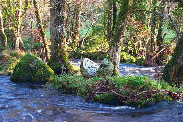 Sculpture on River Teign. There's a stone sculpture on an island in the River teign. Made by Peter Randall-Page it is made from a granite boulder - called Granite Song
