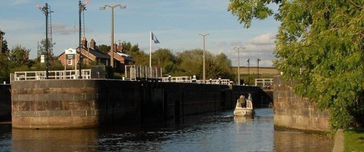 Dutton Locks Pleasure cruiser leaving Dutton Locks