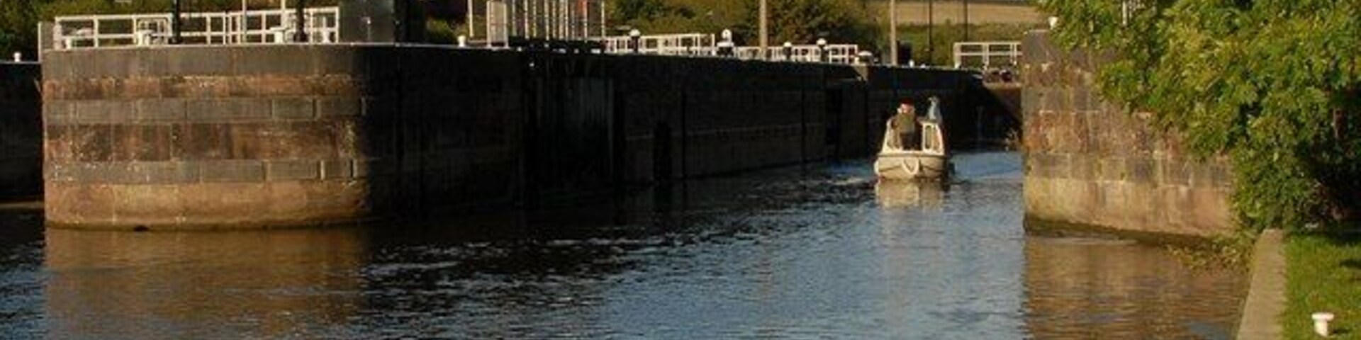 Dutton Locks Pleasure cruiser leaving Dutton Locks