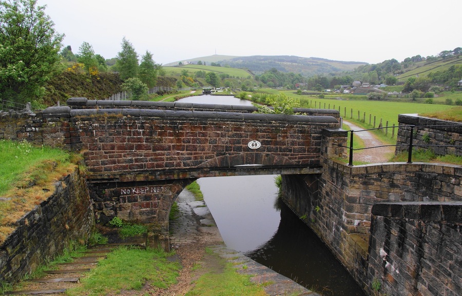 Photograph of Bridge 69, an accommodation bridge over the Huddersfield Narrow Canal near Diggle, Saddleworth, Greater Manchester, England