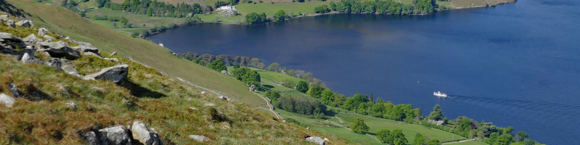 Looking down to Howtown Wyke as the first Ullswater steamer of the day calls in on its trip from Pooley Bridge to Glenridding.