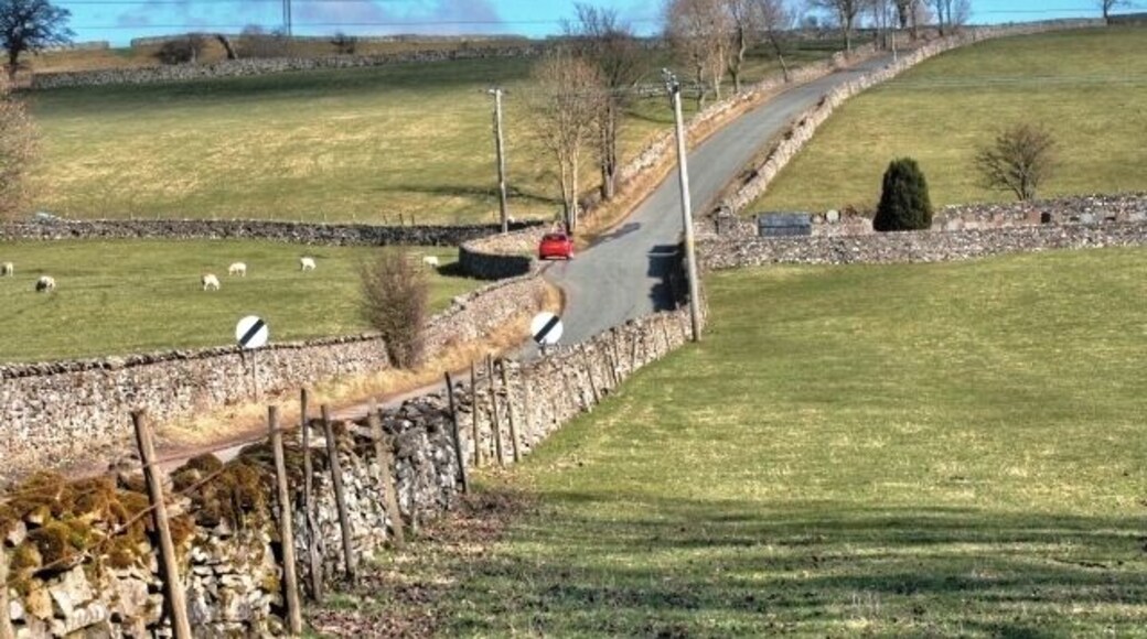 Road to Crosby Ravensworth Passing the cemetery on the right.