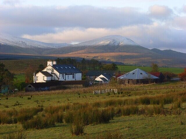 Troutbeck Inn The hamlet of Troutbeck surrounds a sheep market and former railway station. Clough Head, the northern end of the Helvellyn range, is in the background.