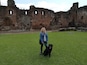 Red ruins of a Castle in the market town of Penrith. There's also a park with bandstand & cafe.