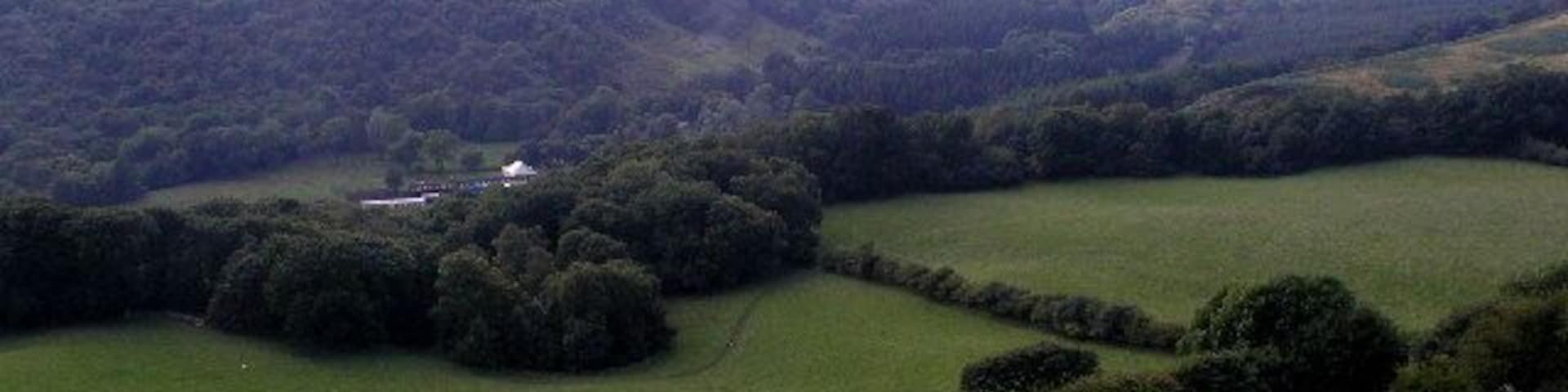 Levisham Station in Newtondale. Some rolling stock of the North Yorkshire Moors Railway can just be seen in the photograph at Levisham Station (see other picture for details of the location).