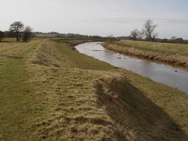 River Wyre At Great Eccleston At this time full of floating debris.
