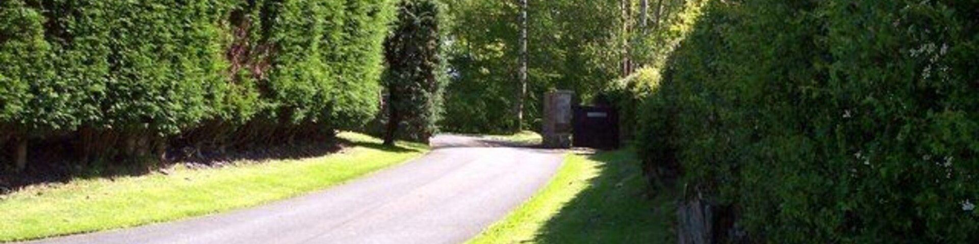 Entrance for path to Higher Lane from Tithe Barn Lane Cattle grid in road with stile to the left of gateway leads to the path