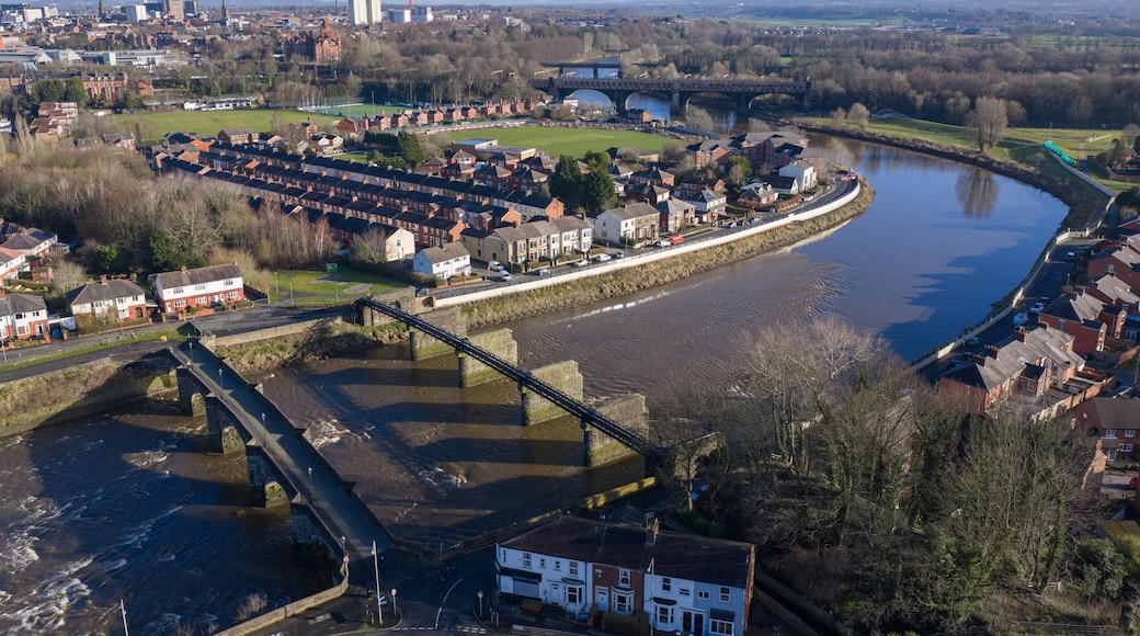 Aerial panorama of River Ribble bridges and Preston city skyline.
