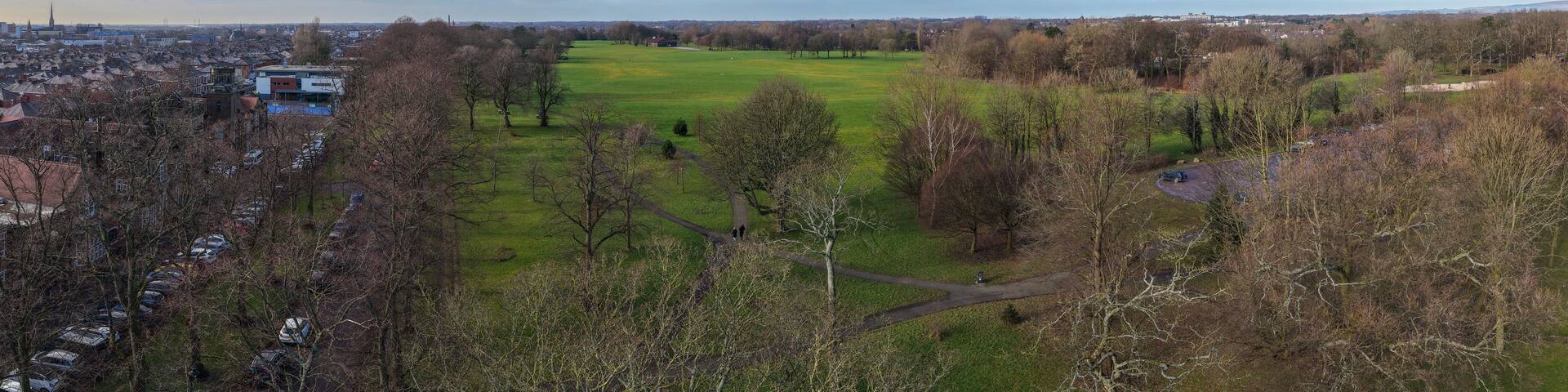 Aerial panorama of Moor Park sports courts and historic parkland in Preston, Lancashire.