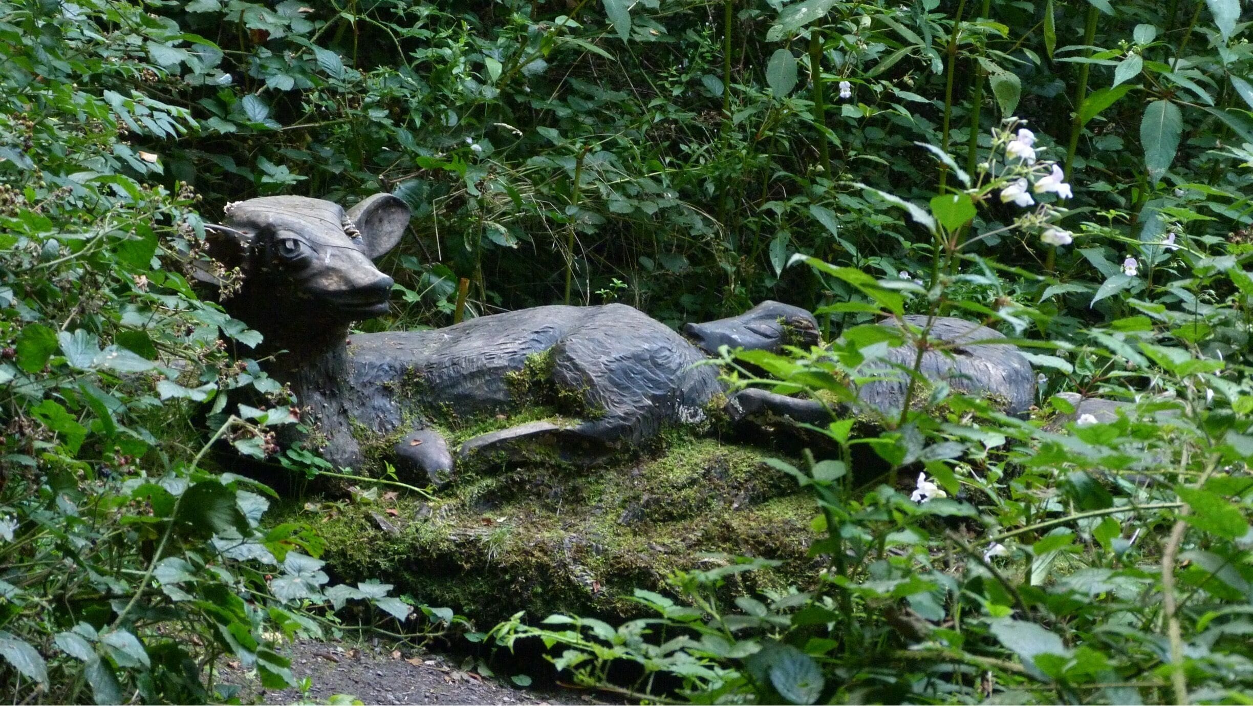 Wood sculpture of deer