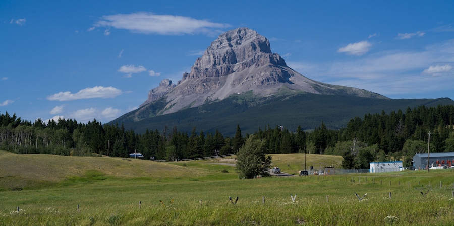Crowsnest Mountain seen from meadow, Coleman, Alberta, Canada