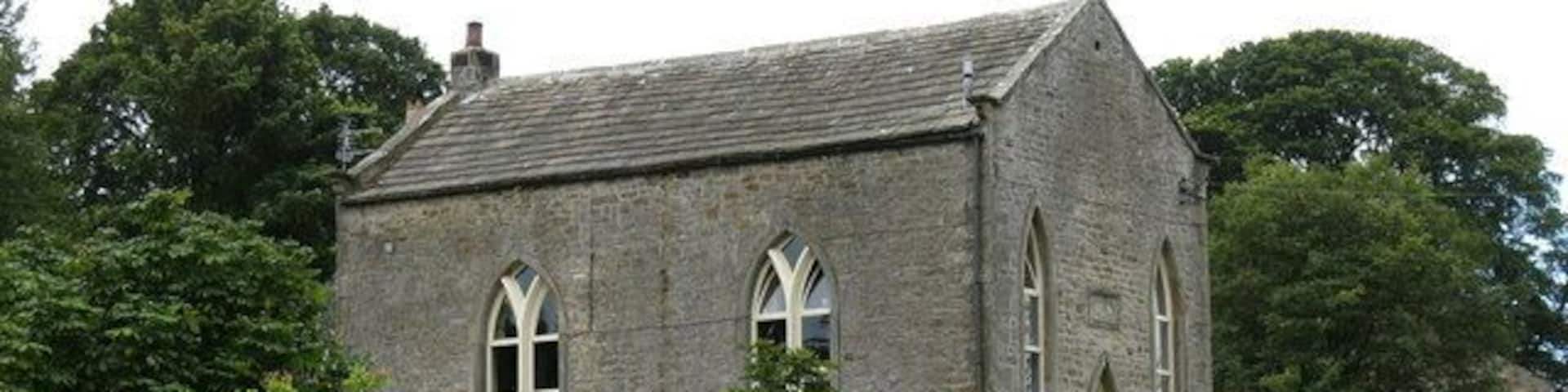 Converted chapel at Barningham. Former Wesleyan chapel of ca. 1815, now converted into a dwelling house which has a pleasant view over the green.