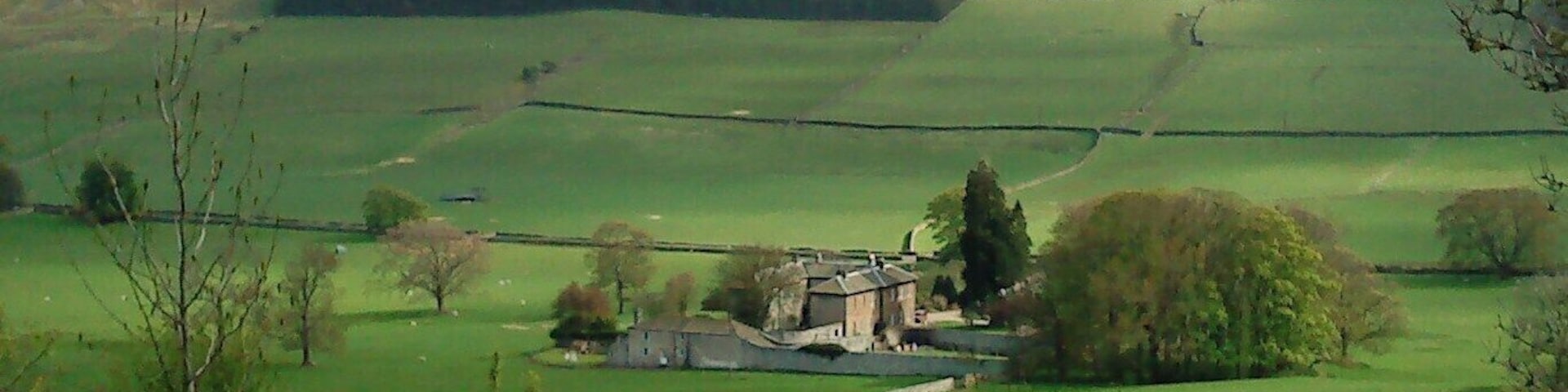 Ellerton Abbey, near to Marrick, North Yorkshire, England. A fine pad built in 1830, named after the nearby ruins of the cistercian abbey of Ellerton. Featured as the home of Mrs Pumphrey & Tricky-Woo in the TV series "All Creatures Great and Small". Long Scar Plantation is the ablong block of conifers below Ellerton Scar.