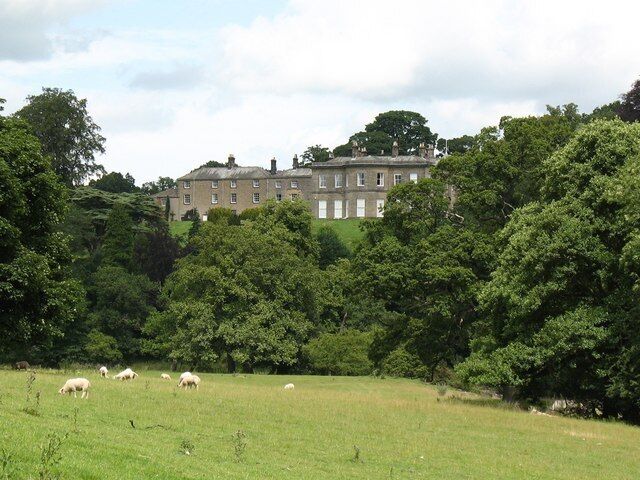 Park land by the Ure The scattering of mature trees identify this as park land, perhaps at one time belonging to Clifton Castle which stands on the other bank of the River Ure [although there is no bridge]. Clifton Castle is a large country house dating from 1802-10. The south front can be seen here, but the main elevation is to the east where there are Ionic columns supporting a classical pediment.