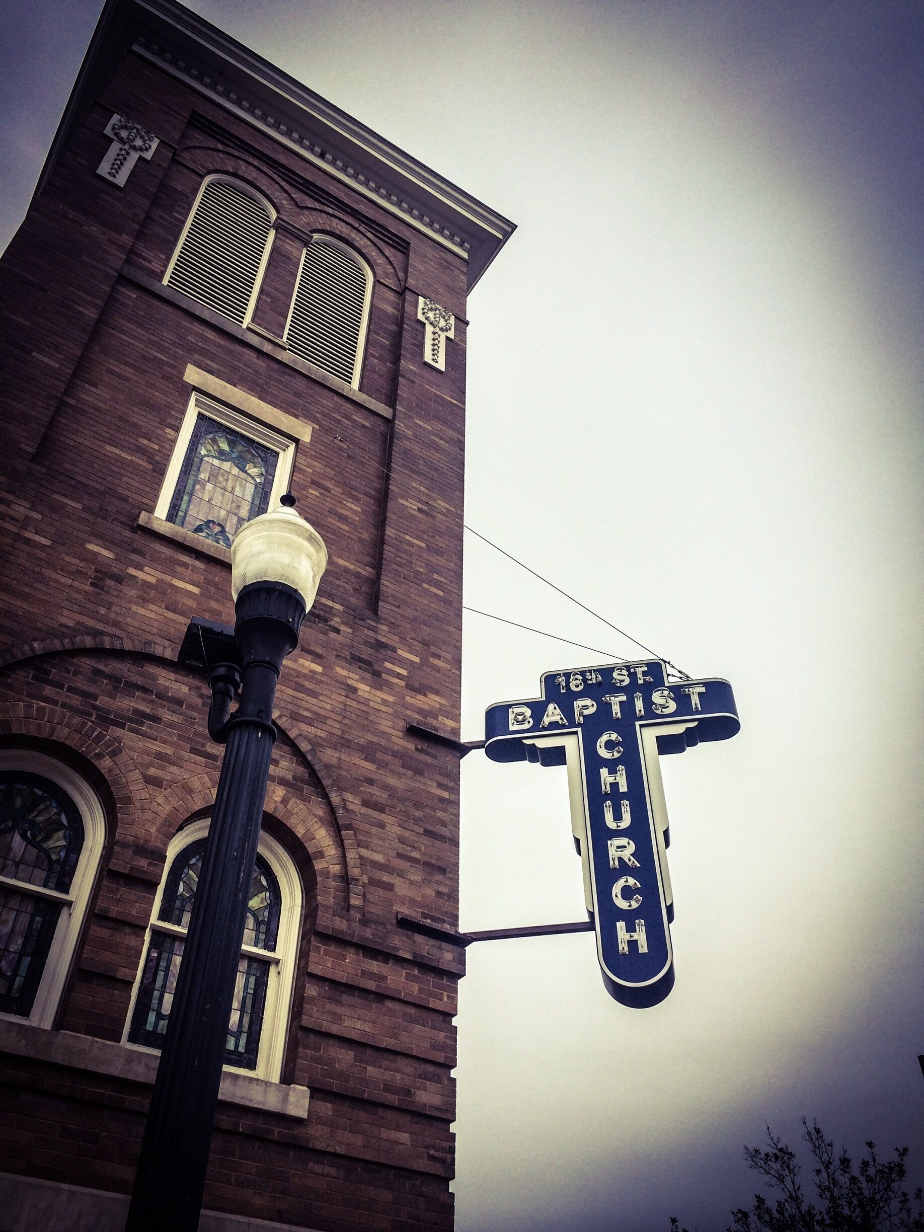 A street sign for 16th St Baptist Church.