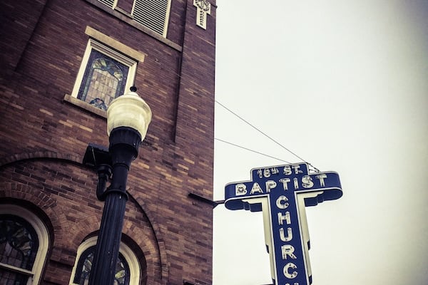 A street sign for 16th St Baptist Church.