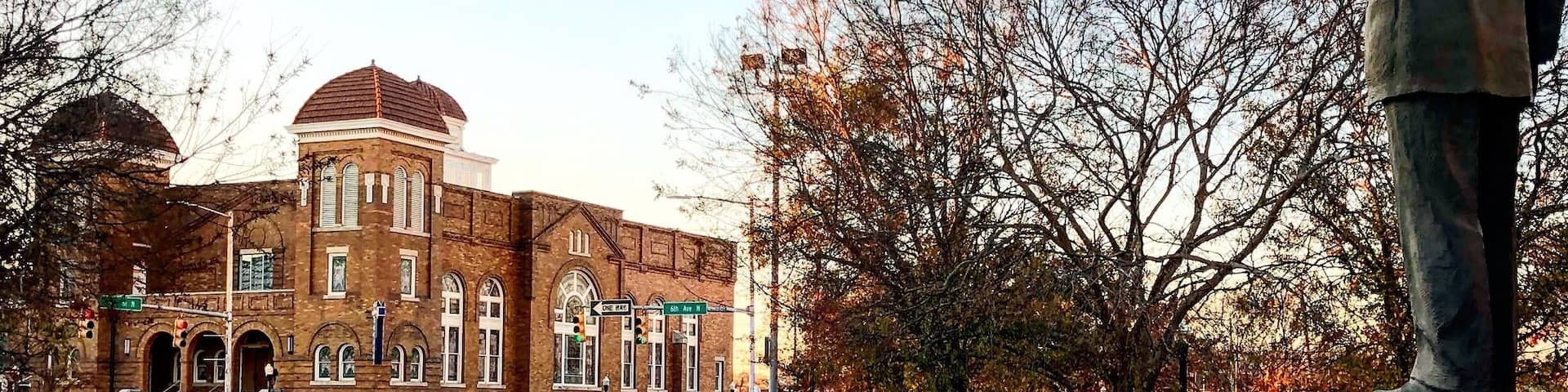 A statue of Martin Luther King Jr. looks towards the 16th Street Baptist Church in Birmingham, Alabama. The 1963 bombing of the church by the KKK murdered 6 children in total and sparked outrage across the world. This marked a turning point in the Civil Rights Movement. #civilrights #historymatters