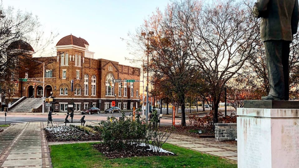 A statue of Martin Luther King Jr. looks towards the 16th Street Baptist Church in Birmingham, Alabama. The 1963 bombing of the church by the KKK murdered 6 children in total and sparked outrage across the world. This marked a turning point in the Civil Rights Movement. #civilrights #historymatters