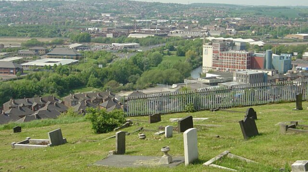 The bottom of Moorgate Cemetery From here there is a fine view out over the Rother and Don valleys. The Rank Hovis flour mill is the dominant building.