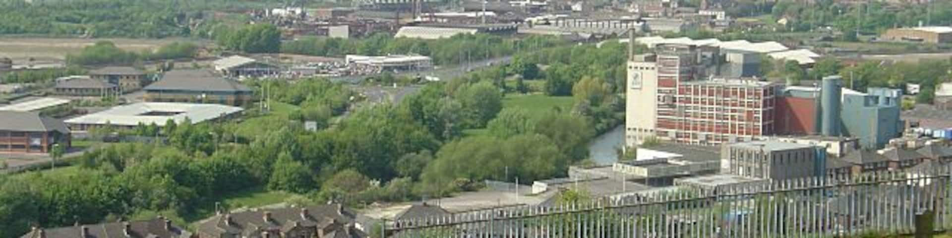 The bottom of Moorgate Cemetery From here there is a fine view out over the Rother and Don valleys. The Rank Hovis flour mill is the dominant building.