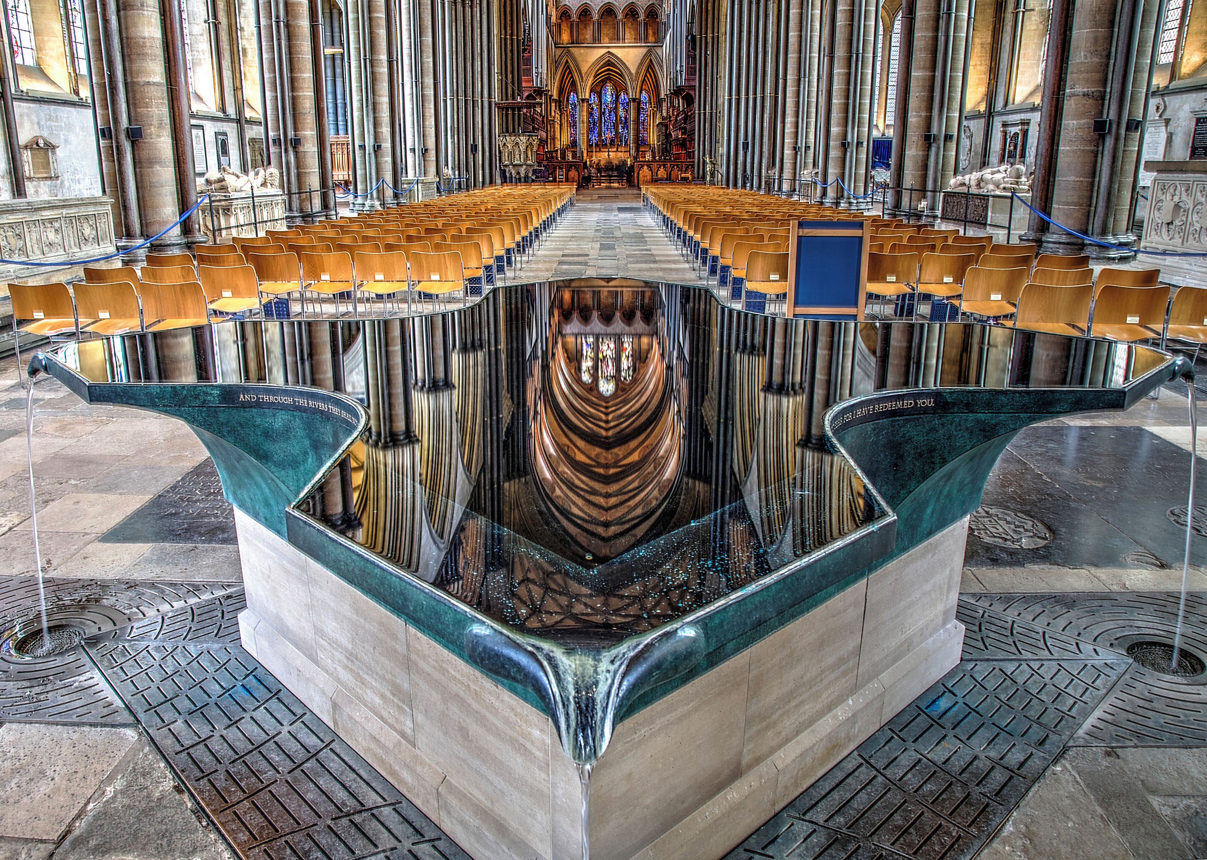 The wonder of the historic site at Salisbury Cathedral is complimented with the modern font in the middle of the church and this offers a contemplative sight for visitors.