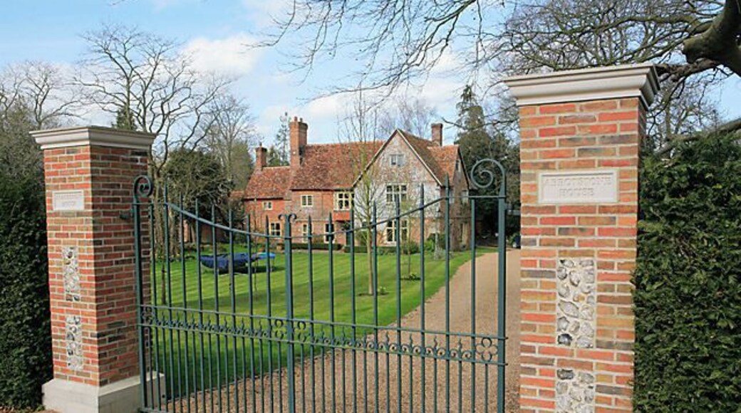 Abbotstone House, The Street, Whiteparish. Metal entry gates on brick gateposts.