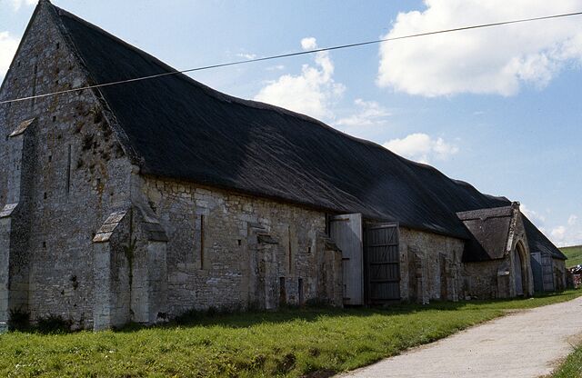 The Tithe Barn at Place Farm - Tisbury Supposedly the largest tithe barn in England (though not the longest), it dates from the C15. It's part of the group at Place Farm that includes the farmhouse and gatehouses, considered one of the finest surviving groups of monastic grange buildings in England. Owned by the Abbess of Shaftesbury until the Dissolution. Grade I Listed.