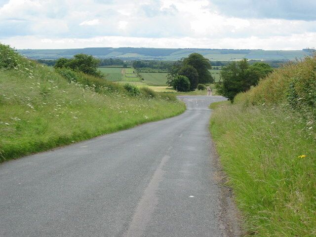 View across Charm Park to Staxton Wold. The high radio mast at RAF Staxton Wold can just be picked out on the top of the Wold in the centre of the picture.