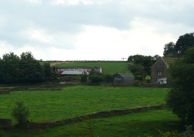 Train en-route from Penistone to Huddersfield Photograph taken from Carr Lane Farm. This is a journey we keep promising ourselves as the views are said to be very spectacular. See http://www.penline.co.uk/