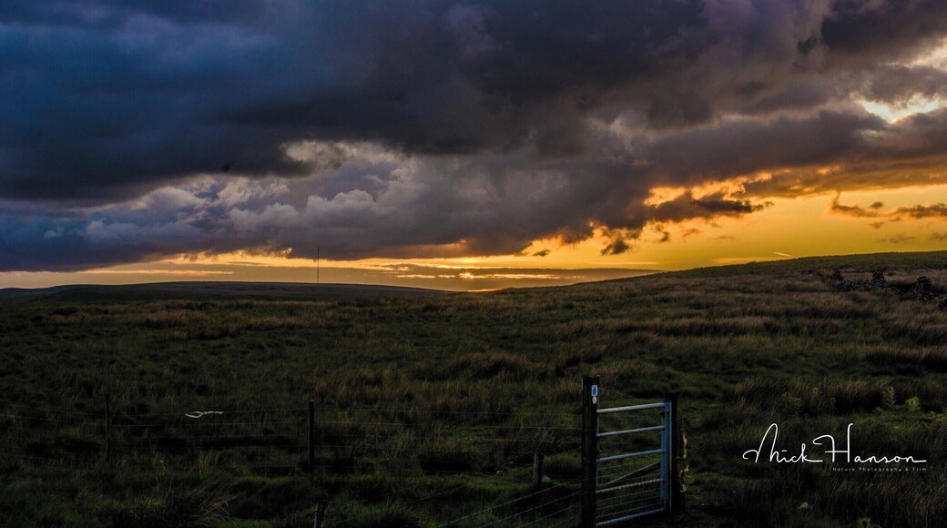 Sunset behind stormy clouds.