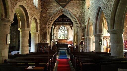 All Hallows nave Looking east towards the 19th century chancel arch with arcades of c1200, the north one still Romanesque, the Gothic south one slightly later