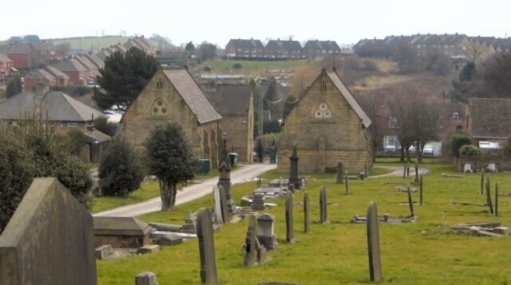 Charltonbrook Cemetery. Looking south from the heights of the cemetery, past the twin chapels at its entrance. Houses at Burncross stand on the adjacent hill.