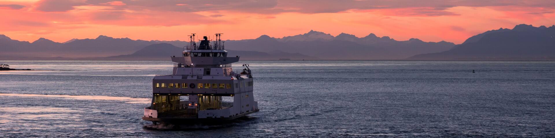BC Ferry near active pass in the Gulf Islands at sunset.