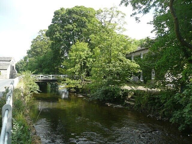 Mill Bridge, Bell Busk, Coniston Cold CP I remember this from cycling clubruns fifty years ago when we used to ride over the bridge for 'tea-only' (i.e. with our own sandwiches)in a farmhouse kitchen with a flitch (large piece of ham) hung from the ceiling. I think this was Mill House rather than the building in this view, which is Mill Lodge.